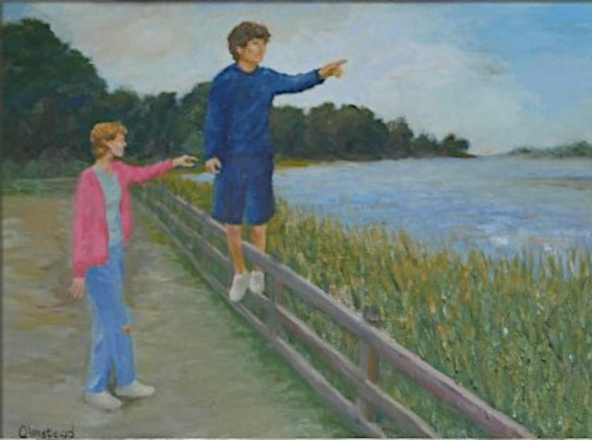 Two young people in a field 